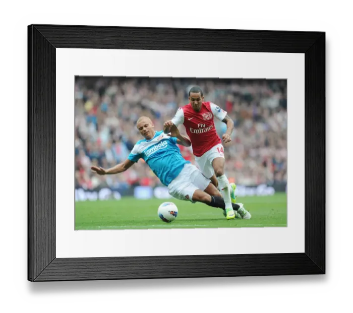 Framed Print : Theo Walcott vs Wes Brown: A Footballing Rivalry Unfolds at Emirates Stadium (Arsenal vs Sunderland, 2011-12) Framed Print : Theo Walcott vs Wes Brown: A Footballing Rivalry Unfolds at Emirates Stadium (Arsenal vs Sunderland, 2011-12)