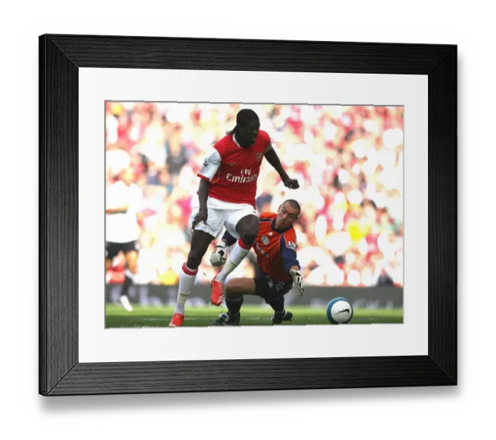 Framed Print : Emmanuel Adebayor rounds Stephen Bywater (Derby) to score Arsenal 2nd goal his 1st Framed Print : Emmanuel Adebayor rounds Stephen Bywater (Derby) to score Arsenal 2nd goal his 1st