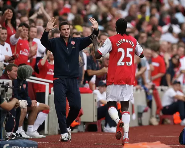 Emmanuel Adebayor celebrates scoring Arsenals 2nd goal his 1st with substitute Robin van Persie. Arsenal 5: 0 Derby County. Barclays Premier League. Emirates Stadium, 22  /  9  /  07. Credit: Arsenal Football Club  / 