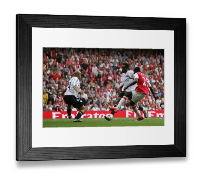 Framed Print : Emmanuel Adebayor scores Arsenals 5th goal his 3rd past Tyrone Mears (Derby) Framed Print : Emmanuel Adebayor scores Arsenals 5th goal his 3rd past Tyrone Mears (Derby)