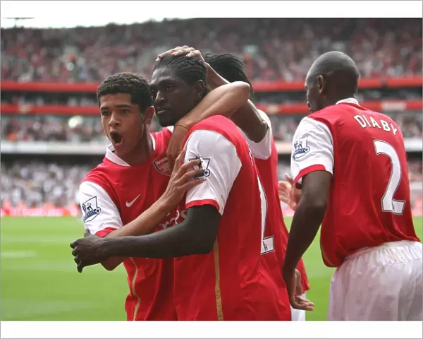 Emmanuel Adebayor celebrates scoring Arsenals 3rd goal his 2nd