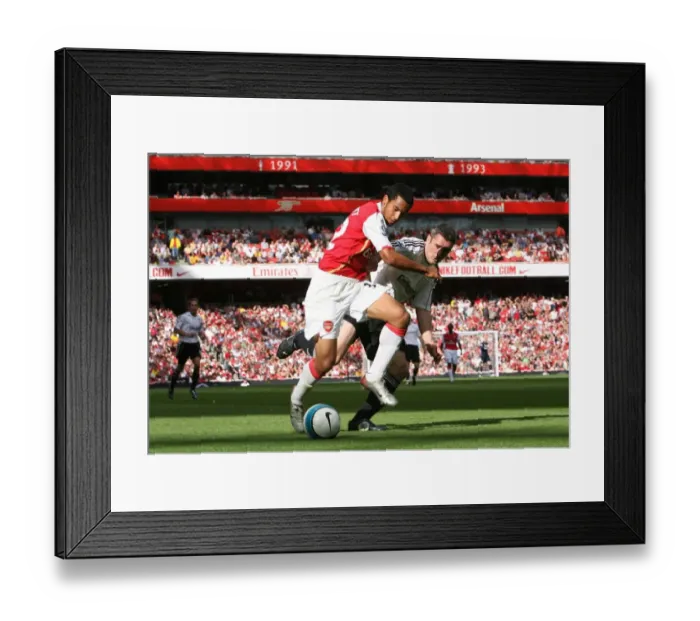 Framed Print : Theo Walcott (Arsenal) Andy Griffin (Derby) Framed Print : Theo Walcott (Arsenal) Andy Griffin (Derby)