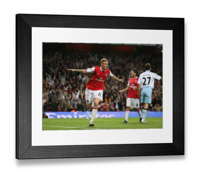 Framed Print : Bendtner's Brilliant Goal: Arsenal Takes 2-0 Lead Over Newcastle in Carling Cup