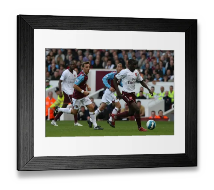 Framed Print : Eboue's Victory: Arsenal's 1-0 Win Over West Ham United (Mark Noble) Framed Print : Eboue's Victory: Arsenal's 1-0 Win Over West Ham United (Mark Noble)