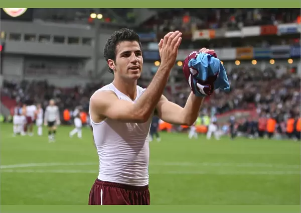 Cesc Fabregas celebrates at the end of the match