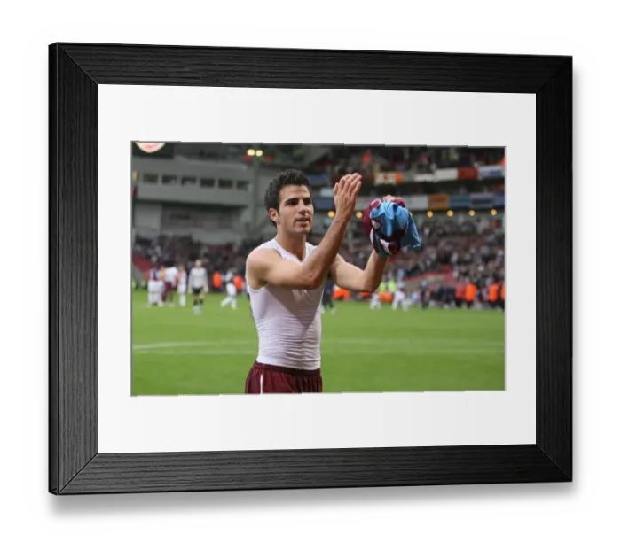 Framed Print : Cesc Fabregas celebrates at the end of the match Framed Print : Cesc Fabregas celebrates at the end of the match