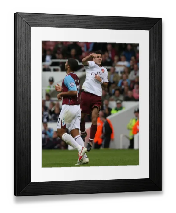 Framed Print : Cesc Fabregas (Arsenal) celebrates at the full time whistle Framed Print : Cesc Fabregas (Arsenal) celebrates at the full time whistle