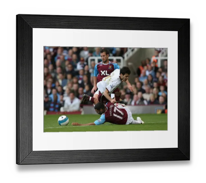 Framed Print : Cesc Fabregas (Arsenal) Hayden Mullins (West Ham) Framed Print : Cesc Fabregas (Arsenal) Hayden Mullins (West Ham)
