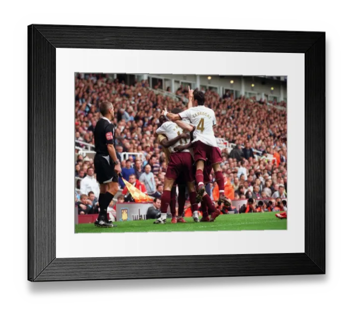Framed Print : Robin van Persie's Game-Winning Goal: Arsenal's Victory Celebration with Eboue and Fabregas vs. West Ham, 2007