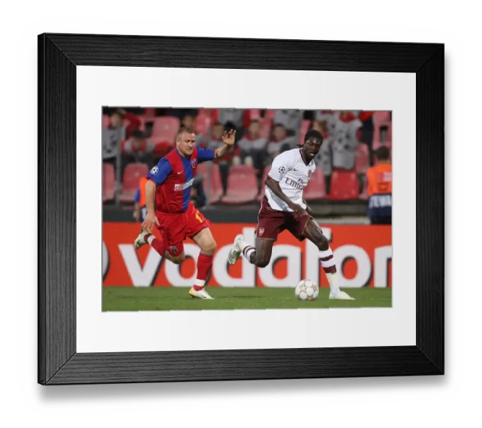 Framed Print : Adebayor's Goal Secures Arsenal's 1-0 Victory Over Steaua in Champions League Group H Framed Print : Adebayor's Goal Secures Arsenal's 1-0 Victory Over Steaua in Champions League Group H