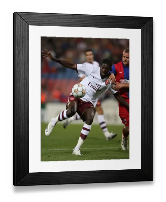Framed Print : Emmauel Adebayor (Arsenal) Eugen Baciu (Steaua) Framed Print : Emmauel Adebayor (Arsenal) Eugen Baciu (Steaua)