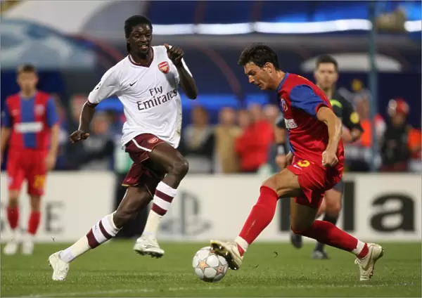 Emmanuel Adebayor (Arsenal) Ionut Rada (Steaua)