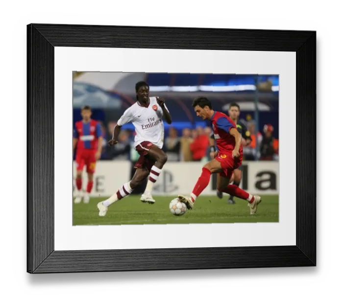 Framed Print : Emmanuel Adebayor (Arsenal) Ionut Rada (Steaua) Framed Print : Emmanuel Adebayor (Arsenal) Ionut Rada (Steaua)