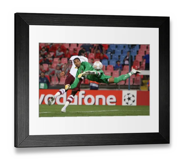 Framed Print : Emmauel Adebayor (Arsenal) Robinson Zapata (Steaua) Framed Print : Emmauel Adebayor (Arsenal) Robinson Zapata (Steaua)