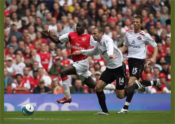 Emmanuel Eboue (Arsenal) Danny Higginbothom (Sunderland)