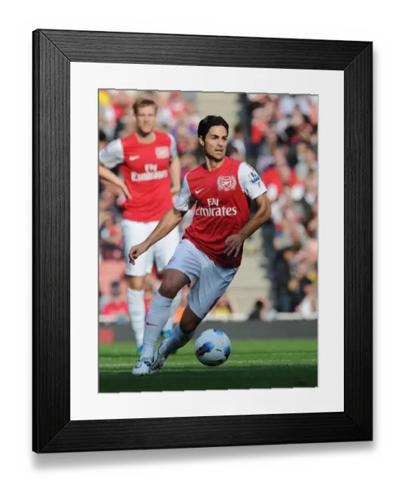 Framed Print : Arsenal's Mikel Arteta Leads the Way: 3-1 Victory Over Stoke City in the Premier League (2011-2012)