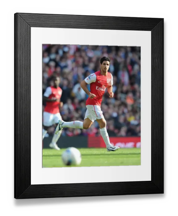 Framed Print : Arsenal's Mikel Arteta Leads 3-1 Victory Over Stoke City in Premier League (2011-2012) Framed Print : Arsenal's Mikel Arteta Leads 3-1 Victory Over Stoke City in Premier League (2011-2012)