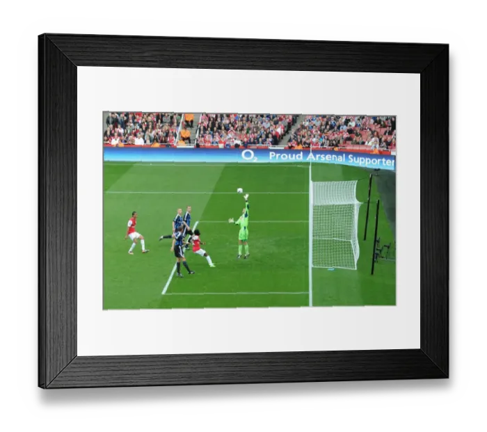 Framed Print : Arsenal's Triumph: 3-1 Over Stoke City in the Premier League at Emirates Stadium, October 2011