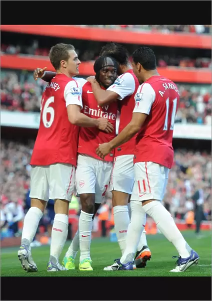 Arsenal's Triumph: Gervinho's Goal Celebration with Ramsey, Chamakh, and Santos (3-1 vs Stoke City, Premier League)