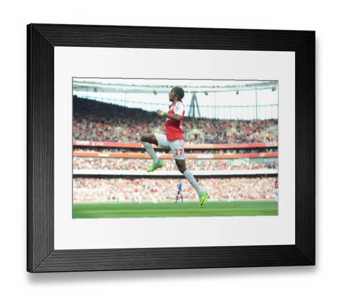 Framed Print : Arsenal's Triumph over Stoke City: Gervinho's Goal - 3:1 Premier League Victory