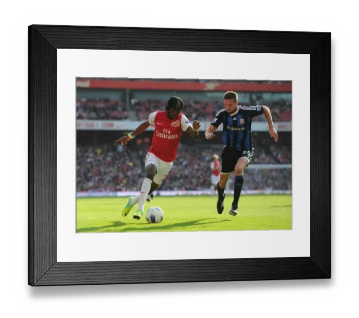 Framed Print : Gervinho's Game-Winning Goal: Arsenal's Triumph over Stoke City (3-1, 2011)