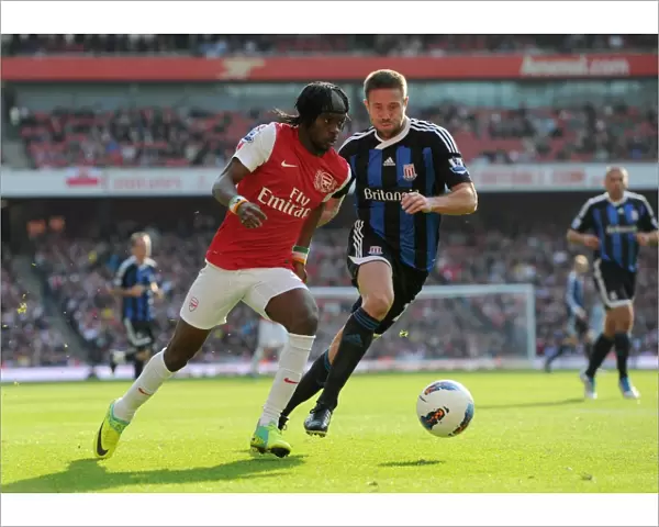 Gervinho (Arsenal) Matthew Upson (Stoke). Arsenal 3: 1 Stoke City. Barclays Premier League