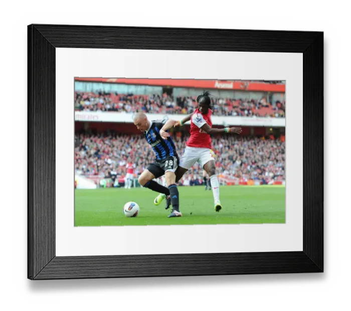 Framed Print : Gervinho's Brace: Arsenal's Triumph over Stoke City (3-1) in the Premier League, 2011-2012 Framed Print : Gervinho's Brace: Arsenal's Triumph over Stoke City (3-1) in the Premier League, 2011-2012