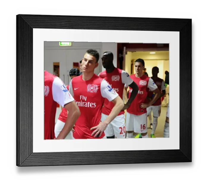 Framed Print : Laurent Koscielny (Arsenal). Arsenal 3: 1 Stoke City. Barclays Premier League Framed Print : Laurent Koscielny (Arsenal). Arsenal 3: 1 Stoke City. Barclays Premier League