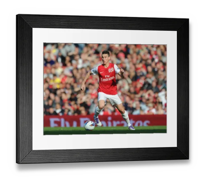 Framed Print : Arsenal's Laurent Koscielny Scores the Decisive Goal in a 3-1 Victory over Stoke City at Emirates Stadium, October 2011 Framed Print : Arsenal's Laurent Koscielny Scores the Decisive Goal in a 3-1 Victory over Stoke City at Emirates Stadium, October 2011