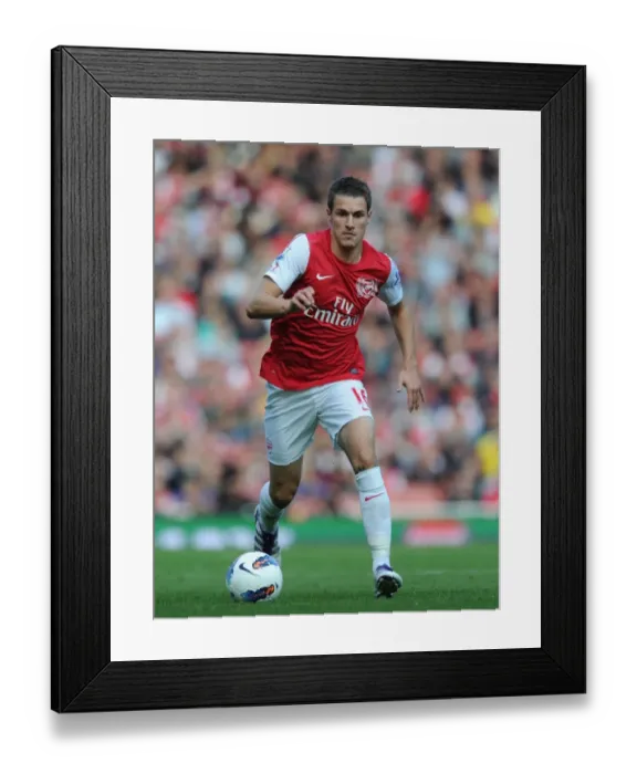 Framed Print : Aaron Ramsey Scores the Game-Winning Goal: Arsenal's 3-1 Victory over Stoke City in the Premier League (October 2011) Framed Print : Aaron Ramsey Scores the Game-Winning Goal: Arsenal's 3-1 Victory over Stoke City in the Premier League (October 2011)