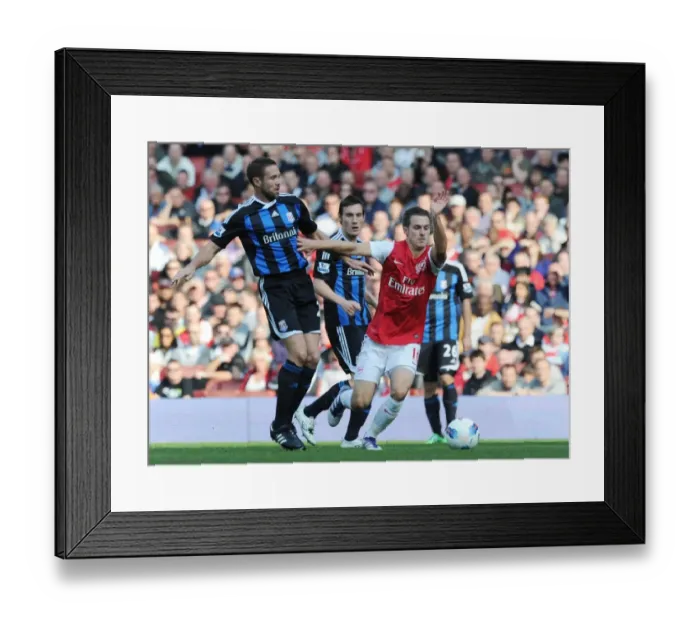 Framed Print : Arsenal's Ramsey Scores in 3-1 Victory over Stoke City in Premier League Framed Print : Arsenal's Ramsey Scores in 3-1 Victory over Stoke City in Premier League