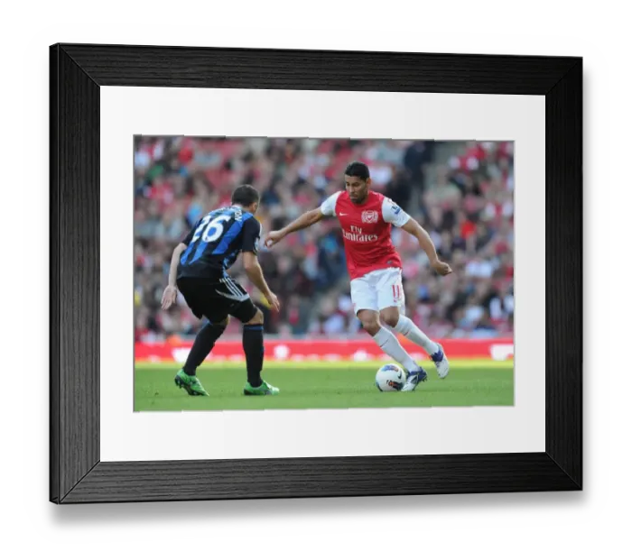 Framed Print : Arsenal Triumph Over Stoke: Andre Santos Scores in 3-1 Victory
