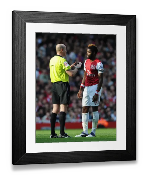 Framed Print : Alex Song (Arsenal) talks to Referee Lee Mason. Arsenal 3: 1 Stoke City