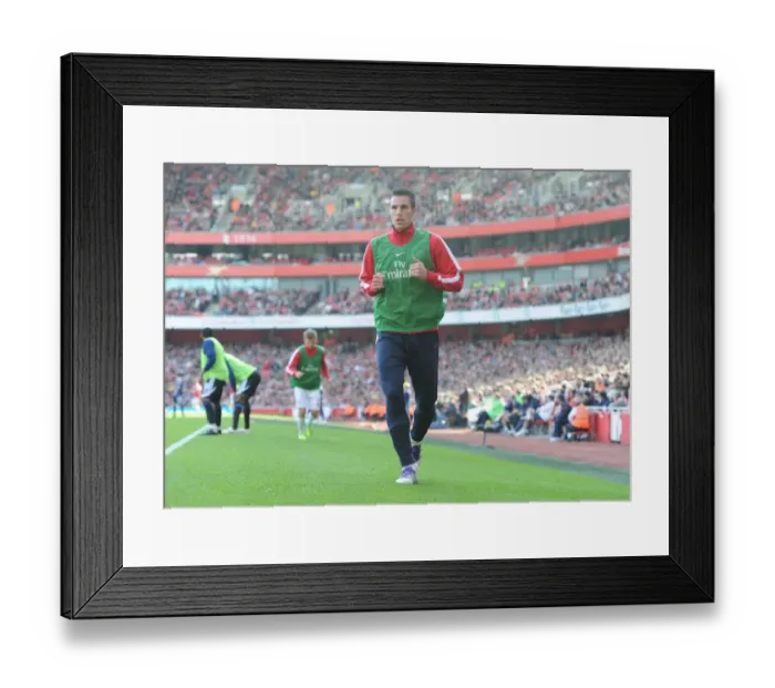 Framed Print : Robin van Persie Warming Up: Arsenal's 3-1 Victory Over Stoke City in the Premier League (2011) Framed Print : Robin van Persie Warming Up: Arsenal's 3-1 Victory Over Stoke City in the Premier League (2011)