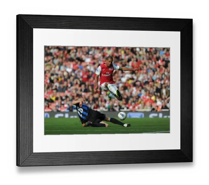 Framed Print : Theo Walcott's Brace: Arsenal's 3-1 Victory Over Stoke City in the Premier League (2011-2012) Framed Print : Theo Walcott's Brace: Arsenal's 3-1 Victory Over Stoke City in the Premier League (2011-2012)