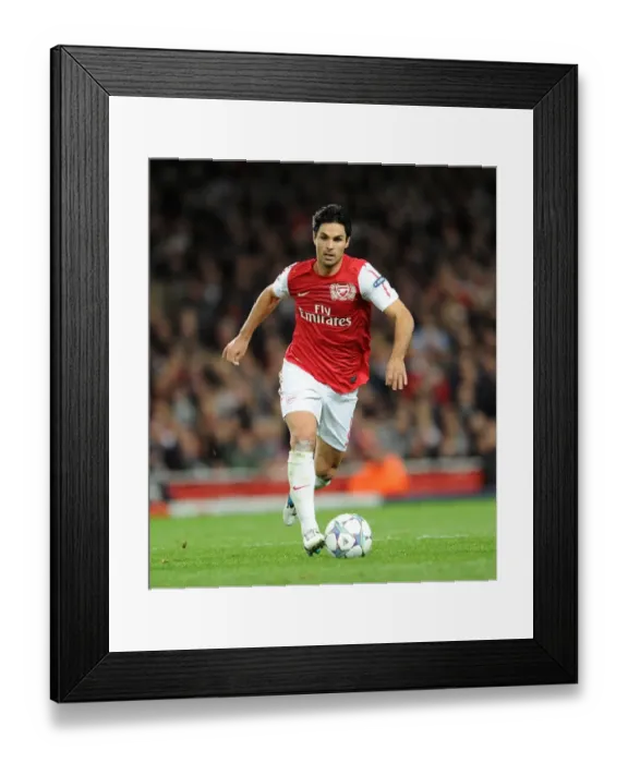Framed Print : Mikel Arteta: Arsenal's Unbeaten Leader in UEFA Champions League Group F (vs Marseille, 11 / 1 / 11) Framed Print : Mikel Arteta: Arsenal's Unbeaten Leader in UEFA Champions League Group F (vs Marseille, 11 / 1 / 11)