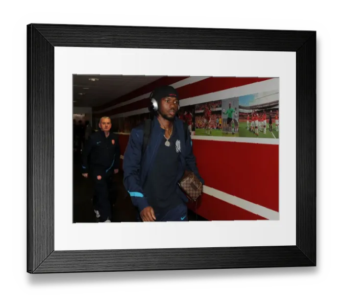 Framed Print : Gervinho Heads to the Arsenal Changing Room before Arsenal FC vs Olympique de Marseille, UEFA Champions League (2011)