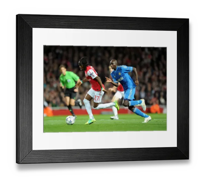 Framed Print : Arsenal vs Marseille: 0-0 Stalemate in Champions League Group F (Gervinho vs Alou Diarra)