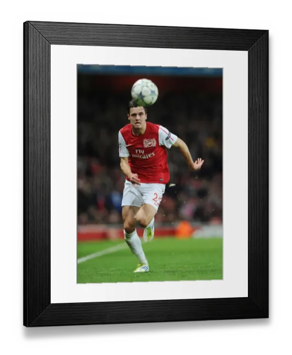 Framed Print : Carl Jenkinson in Action: Arsenal vs Olympique de Marseille, UEFA Champions League 2011-12