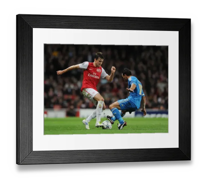 Framed Print : Arsenal vs Marseille: Jenkinson vs Morel - UEFA Champions League Clash Framed Print : Arsenal vs Marseille: Jenkinson vs Morel - UEFA Champions League Clash