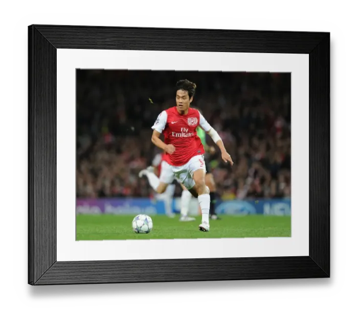 Framed Print : Arsenal's Ju Young Park Goes Head-to-Head with Olympique de Marseille in the UEFA Champions League Framed Print : Arsenal's Ju Young Park Goes Head-to-Head with Olympique de Marseille in the UEFA Champions League