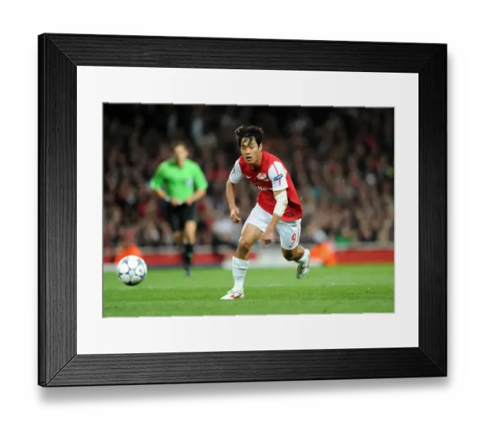 Framed Print : Ju Young Park (Arsenal). Arsenal 0: 0 Marseille. UEFA Champions League. Group F