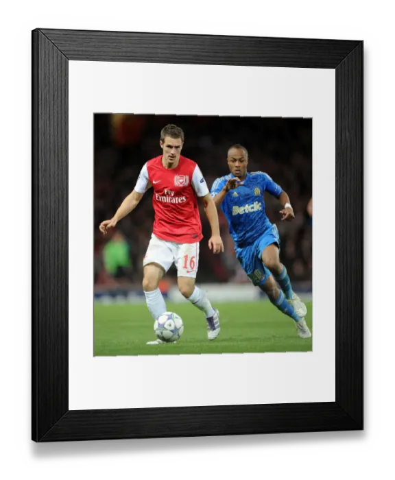 Framed Print : Arsenal vs Marseille: Ramsey vs Ayew - Scoreless Battle in Champions League Group F Framed Print : Arsenal vs Marseille: Ramsey vs Ayew - Scoreless Battle in Champions League Group F