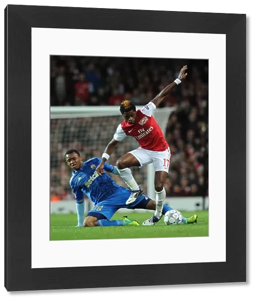 Arsenal vs Marseille: Clash between Alex Song and Jordan Ayew in the 2011-12 UEFA Champions League