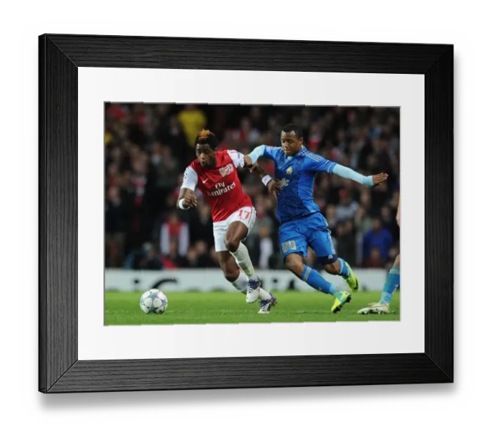 Framed Print : Arsenal vs Marseille: Battle between Song and Ayew in the 2011-12 Champions League Framed Print : Arsenal vs Marseille: Battle between Song and Ayew in the 2011-12 Champions League