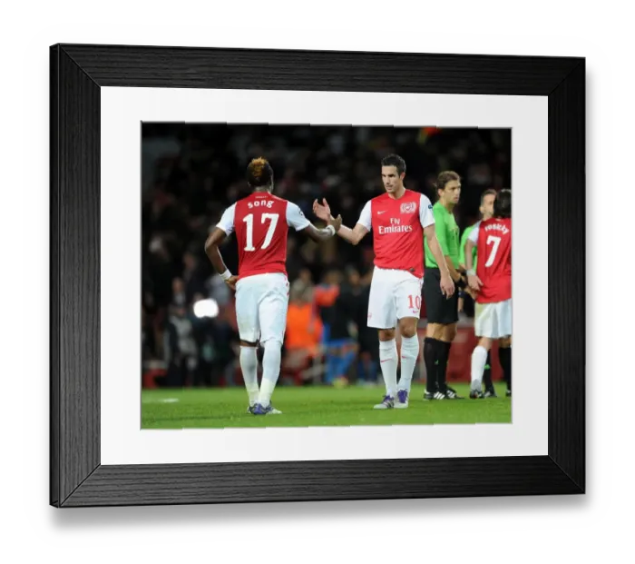 Framed Print : Robin van Persie shakes hands with Alex Song (Arsenal) at the end of the match Framed Print : Robin van Persie shakes hands with Alex Song (Arsenal) at the end of the match