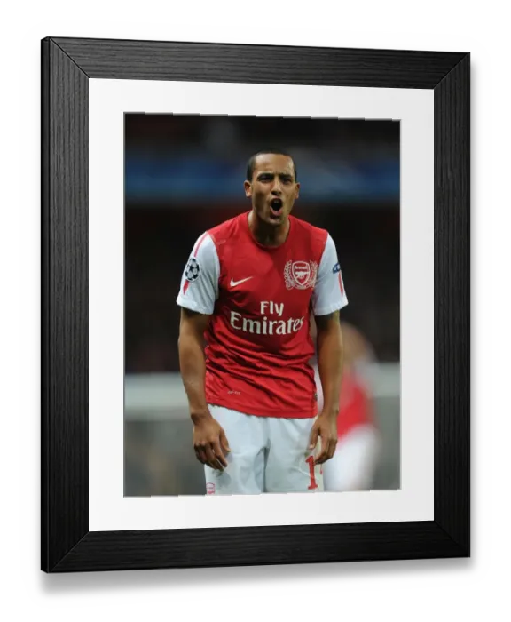 Framed Print : Arsenal vs Marseille: Theo Walcott's Battle in the UEFA Champions League - 0:0 Group F Showdown at Emirates Stadium (November 1, 2011)