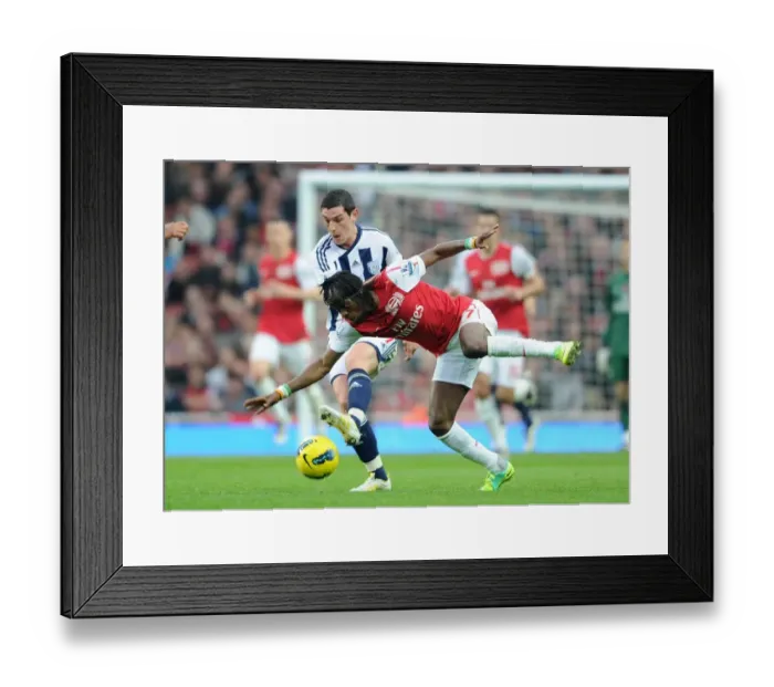 Framed Print : Gervinho (Arsenal) Graham Dorrans (WBA). Arsenal 3: 0 West Bromwich Albion