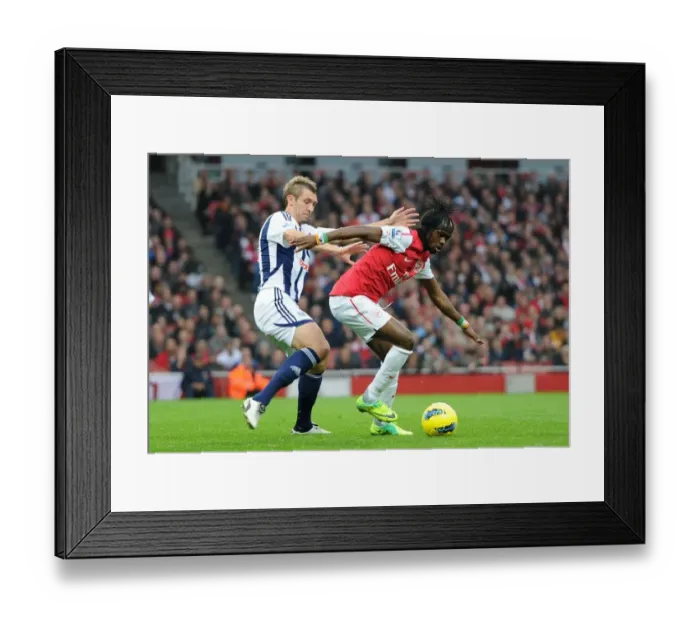 Framed Print : Arsenal Triumphs Over West Bromwich Albion: Gervinho's Brilliant Performance Leads to a 3-0 Victory in the Premier League Framed Print : Arsenal Triumphs Over West Bromwich Albion: Gervinho's Brilliant Performance Leads to a 3-0 Victory in the Premier League
