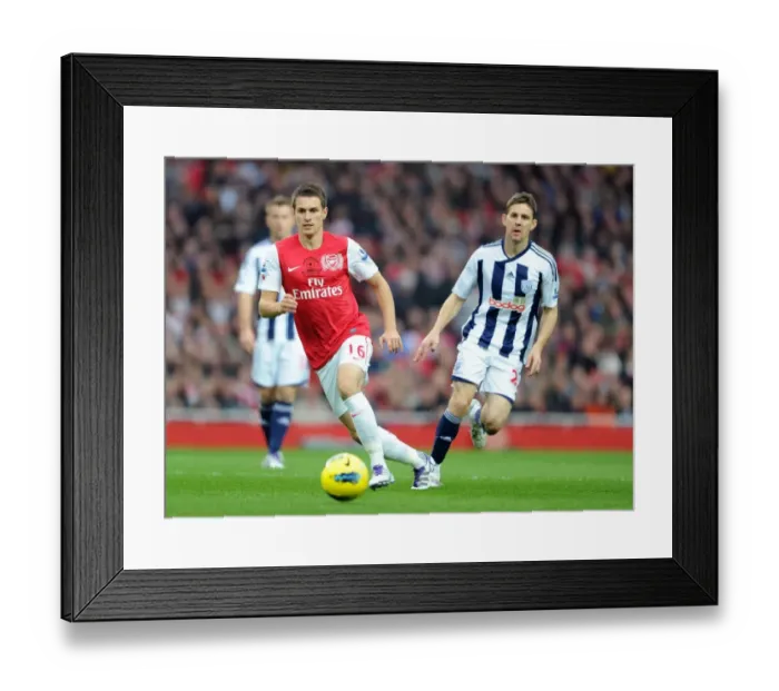 Framed Print : Arsenal's Aaron Ramsey Leads 3-0 Victory Over West Bromwich Albion in Premier League Action Framed Print : Arsenal's Aaron Ramsey Leads 3-0 Victory Over West Bromwich Albion in Premier League Action